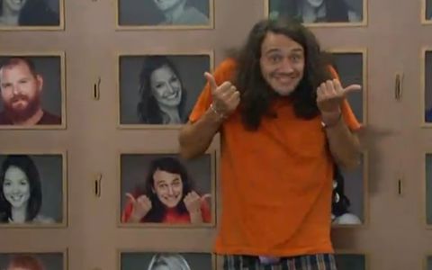 McCrae poses by the Memory Wall