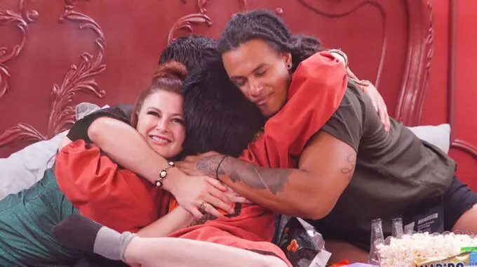 Houseguests hug on Big Brother 27 - Source: CBS