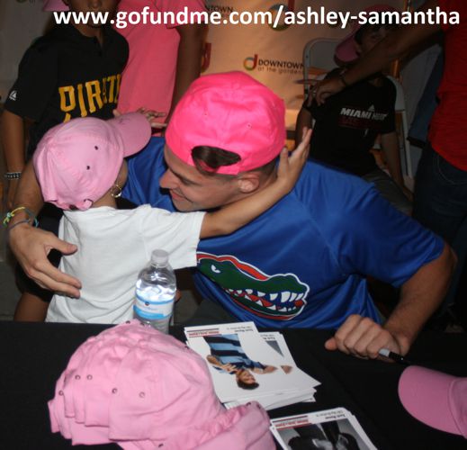 Zach Rance gets a hug from Samantha Housel