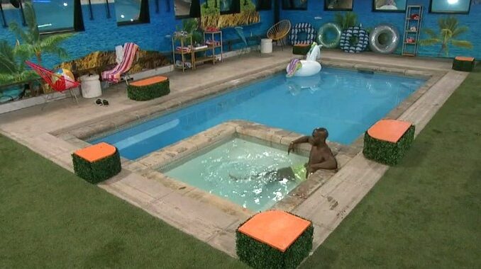 Xavier alone in the Big Brother pool