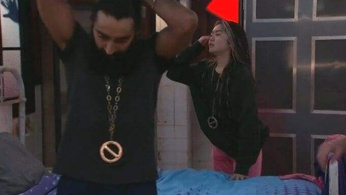 Jag and Blue wearing Veto medallions - CBS